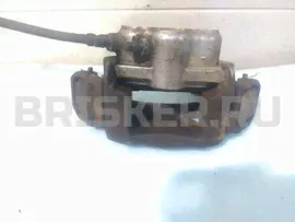 Суппорт передний правый на Шевроле Нива